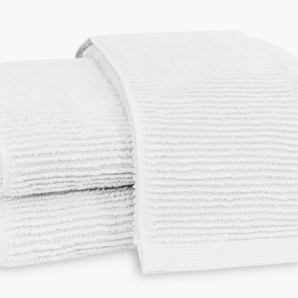 
                      
                        The Aman Towels by Matouk
                      
                    