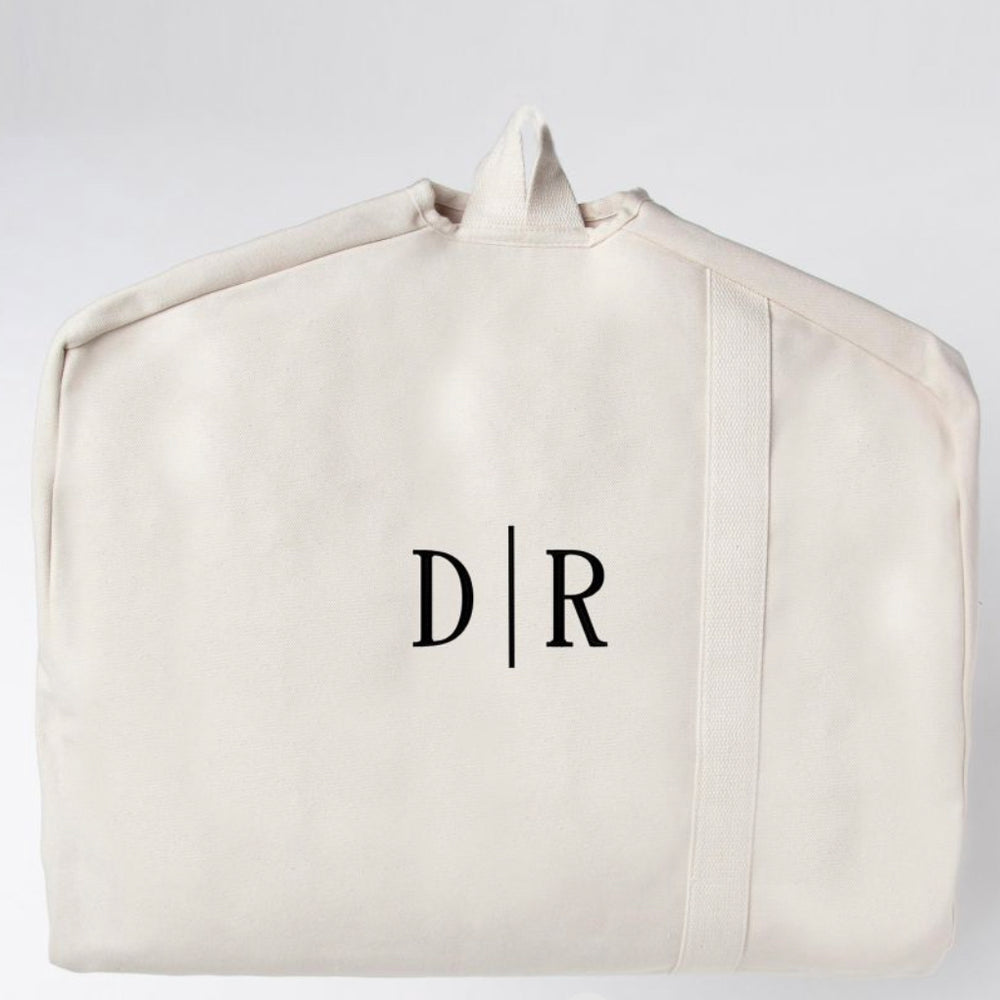 
                      
                        Garment Bag Natural w/navy or just Natural
                      
                    